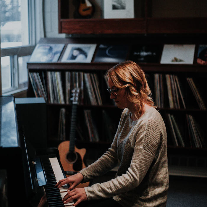 woman playing piano